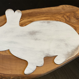 wood cut shaped bunny painted white and distressed with a brown