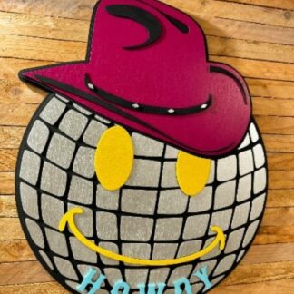 disco ball sign with pink cowgirl cowboy hat with yellow smile face and turquoise word howdy